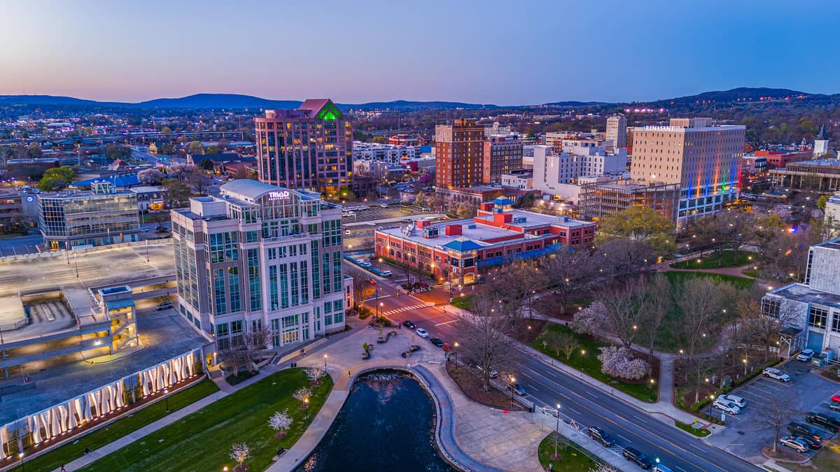 Aerial view of downtown Huntsville, Alabama at dusk, with Big Spring Park